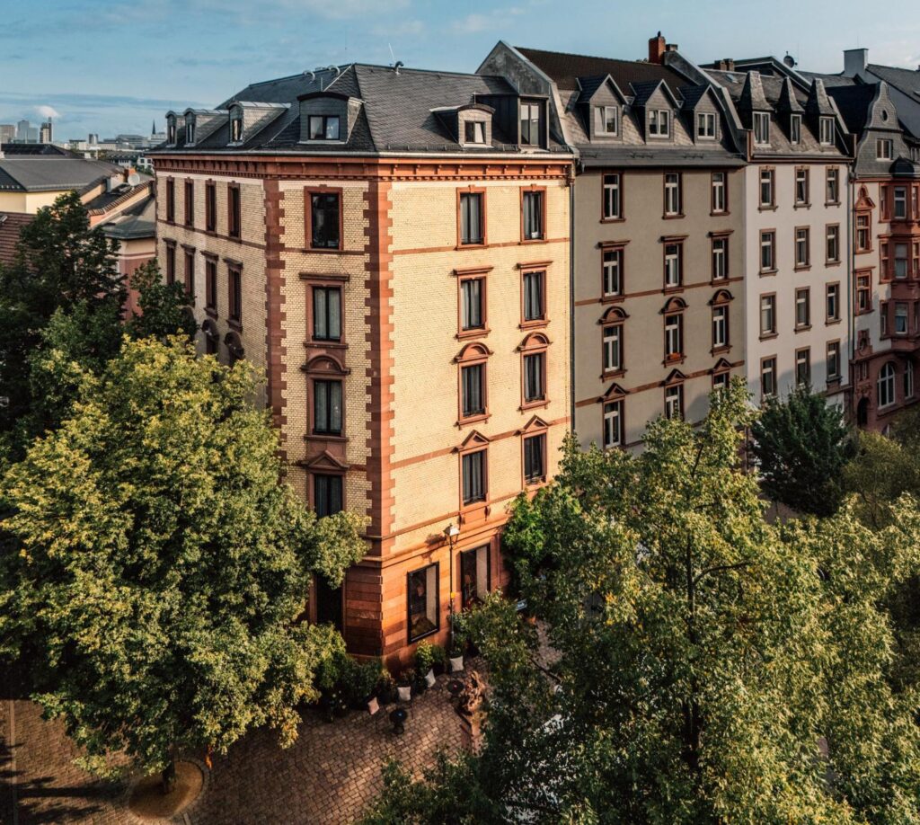 Libertine Lindenberg boutique hotel with red brick and traditional windows in Frankfurt, Germany